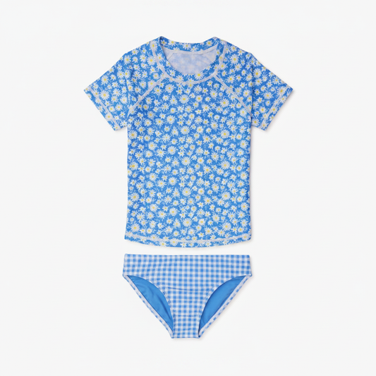 Girls blue daisy rashguard and gingham bikini bottom set hero shot on clean white background, both pieces shown
