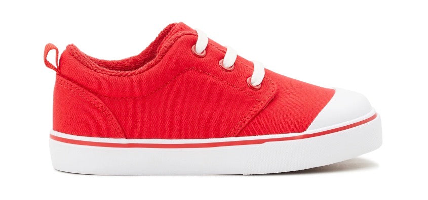 Red sneaker with white sole on a white background
